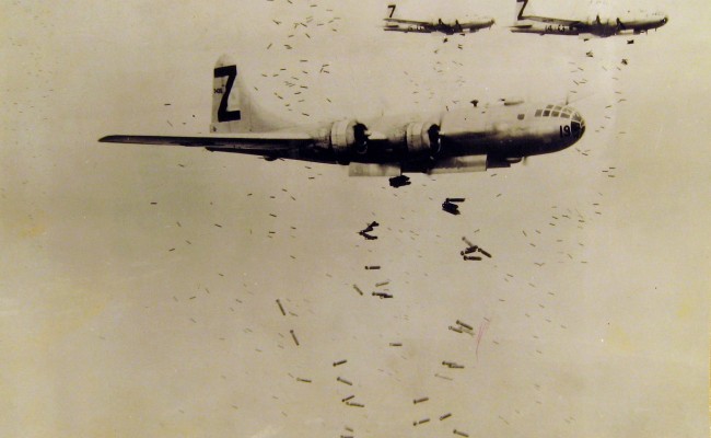 B-29 bombers dropping incendiaries on Yokohama City